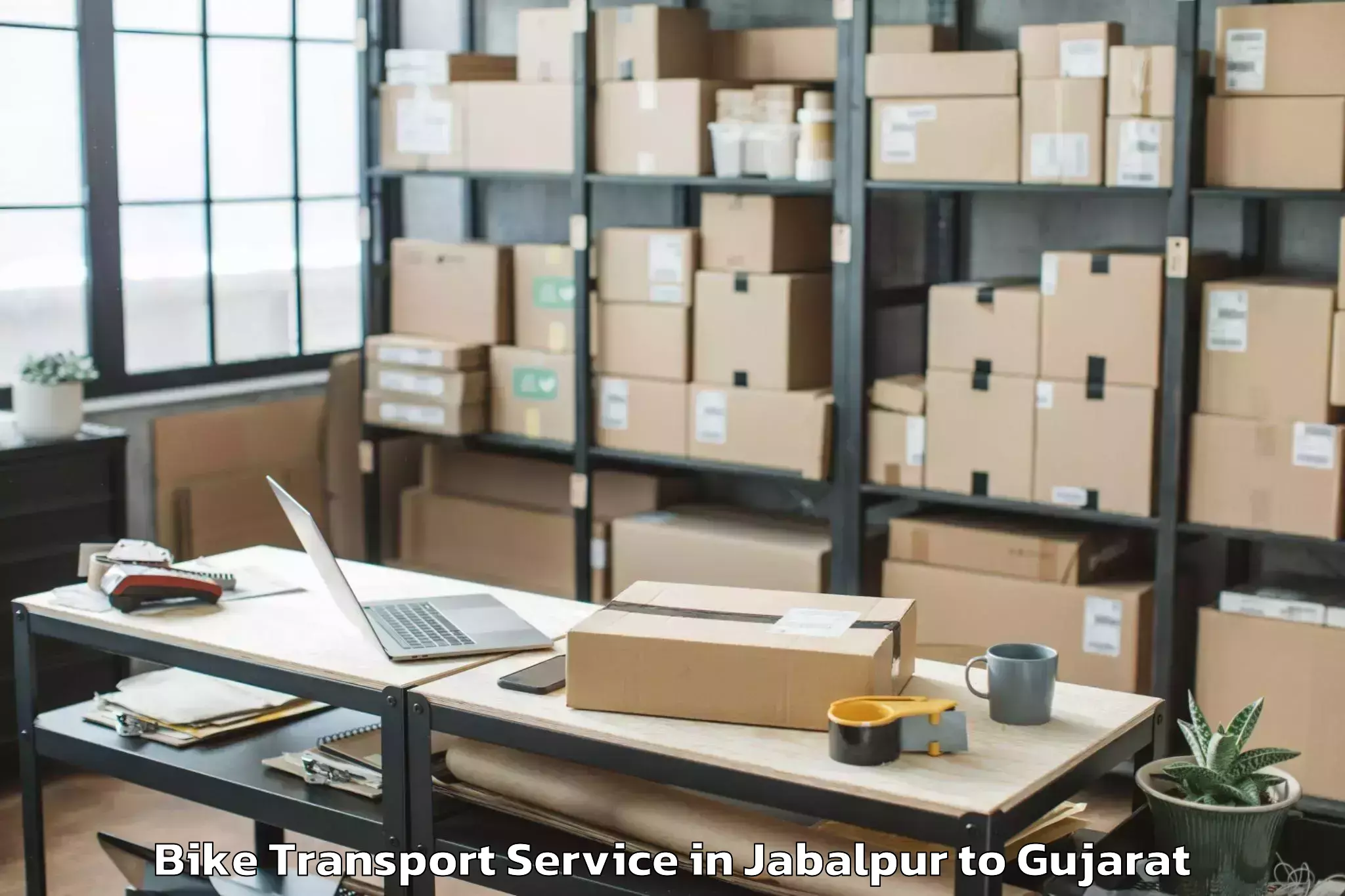 Get Jabalpur to Sardarkrushinagar Dantiwada Ag Bike Transport